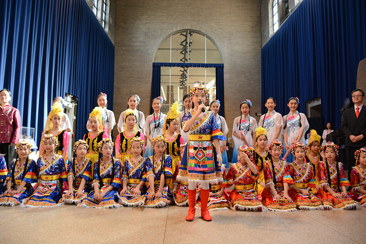 caption: The Little Mulan Dance Troupe from the Great Wall School will perform.