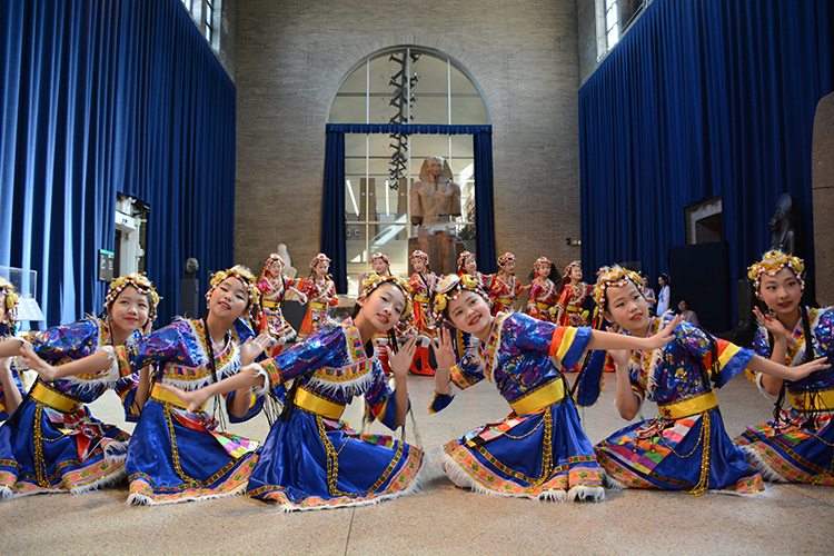 caption: The Little Mulan Dance Troupe from the Great Wall School will perform.