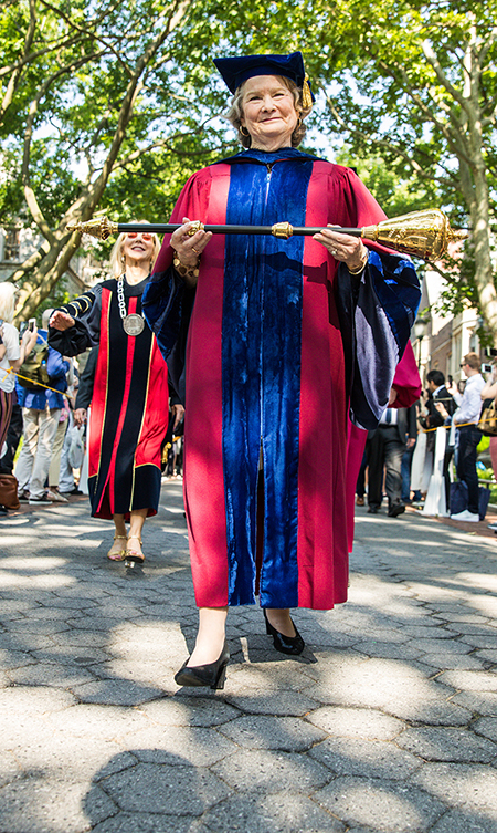 caption: Leslie Kruhly carried the University Mace to Franklin Field.