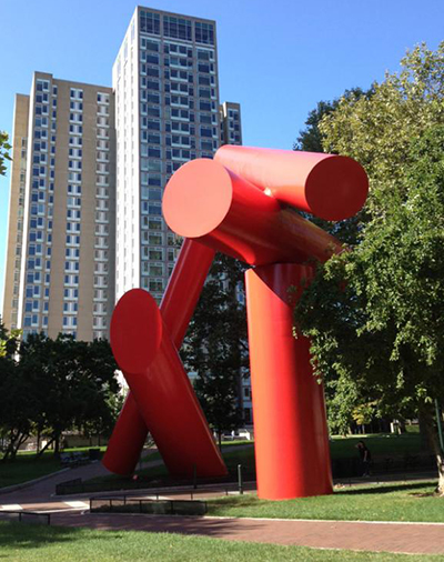 caption: The Covenant by Alexander Liberman, 40 x 25 feet, is made of red-painted rolled steel and was created in 1974 by the architect as part of a city-wide public art program that required developers to include original, site-specific works of public art. It was intended to convey a feeling of bonding together for a higher purpose. It was installed at 39th Street and Locust Walk in 1975.