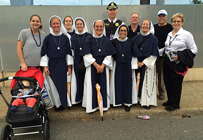 caption: Members of the Penn DPS welcome visitors to campus.