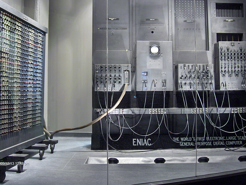 caption: ENIAC on display at the Moore School Building in the School of Engineering  and Applied Science.