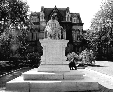 Benjamin Franklin statue in front of College Hall.