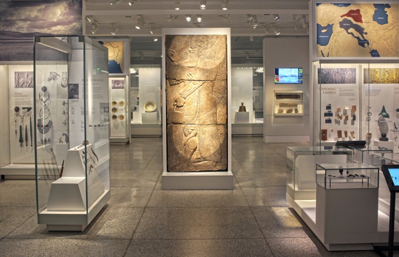 caption: In the center of the new Middle East Galleries, (above) is  a monumental relief of Assyrian Winged Genie from the Palace of Ashur-Nasir-Pal II, Nimrud, Iraq, 883-859 BCE. It is among the more than 1,200 ancient artifacts on display.