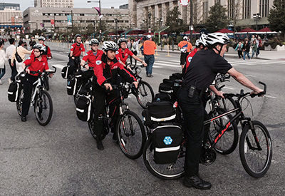 caption: Gene Janda, chief of fire and emergency services in DPS, led the MERT team on their rounds in University City during the weekend.