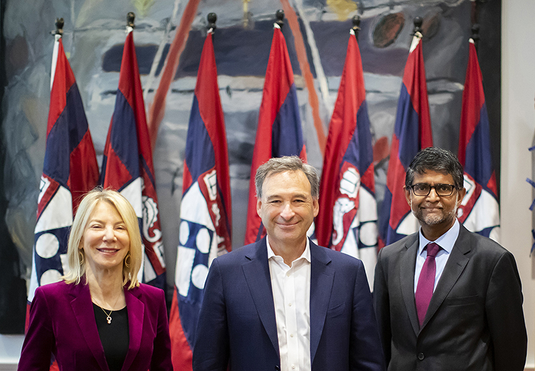caption: Penn President Amy Gutmann, alumnus  Harlan M. Stone, and Penn Engineering Nemirovsky  Family Dean  Vijay Kumar (left to right) at the gift agreement signing to support the construction of a new Data Science Building at the University of Pennsylvania. Photograph by Eric Sucar, University Communications.