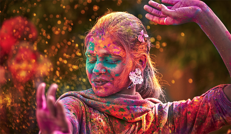 caption: The Hindu tradition of Holi celebrates the arrival of spring through the joyous throwing of brightly colored powders. Photo courtesy Penn Museum.