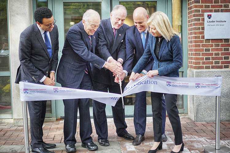 caption: Penn President Amy Gutmann (right) dedicated the renovation of the Lauder Institute building with (from left) Provost Wendell Pritchett, brothers and Penn alumni Leonard A. Lauder and Ronald S. Lauder, and Institute director Mauro Guillén.  