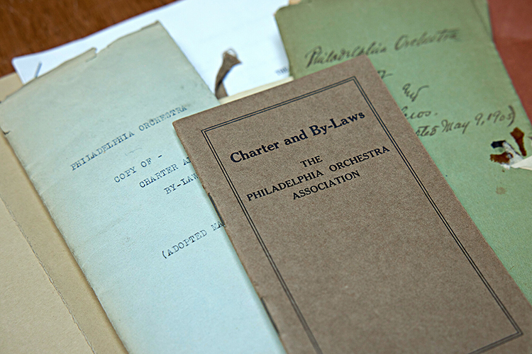 caption: Early charter documents of the Philadelphia Orchestra Association. From the Philadelphia Orchestra Association and Academy of Music Archives at the Kislak Center.