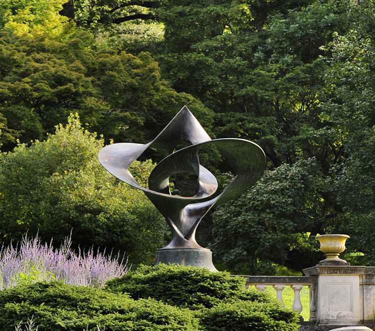 caption: Sculptures including After B.K.S. Iyenger by Bob Engman can be seen throughout the Arboretum.