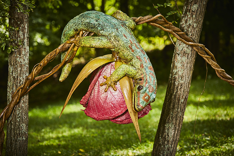 caption: Gecko pollinator-inspired art at Morris Arboretum & Gardens.