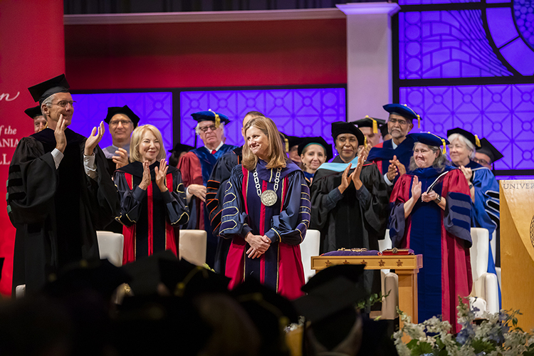 caption: President Magill is applauded during her inauguration on October 21. Photos by Eric Sucar and Scott Spitzer.