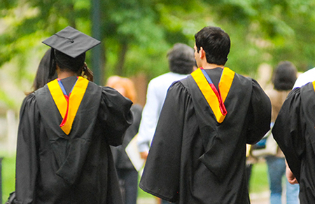 Two people in caps and gowns