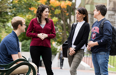 Students talking in group outside