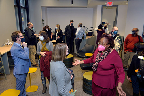 caption: Faculty, staff, students and alumni visited the new ODEI suite.