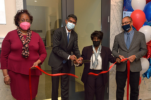 caption: ODEI Director Laura Stubbs, Dean Vijay Kumar, former Director of Multicultural Affairs Cora Ingrum and Associate Dean for Diversity, Equity and Inclusion C.J. Taylor at the ribbon cutting for the new ODEI suite. Photos by Felice Marcera.