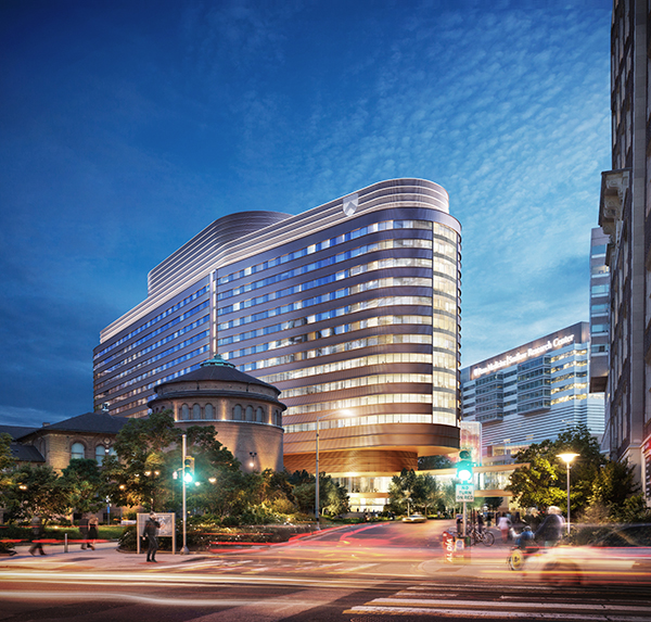 caption: A night view of the 1.5 million-square-foot, future-ready hospital at 34th Street and Civic Center Boulevard that opened on October 30, 2021.