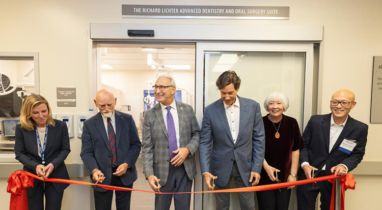 caption: Brady Beale, Colin Harvey, Andrew Hoffman, Richard Lichter, Nadine Chien, and Anson Tsugawa cut the ribbon for the new Richard Lichter Advanced Dentistry and Oral Surgery Suite. 