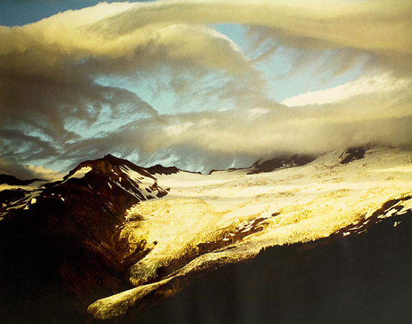 caption:Eliot Porter, Clouds Forming over Mount Baker, Washington, July 30, 1975, chromogenic print, 20” x 24”