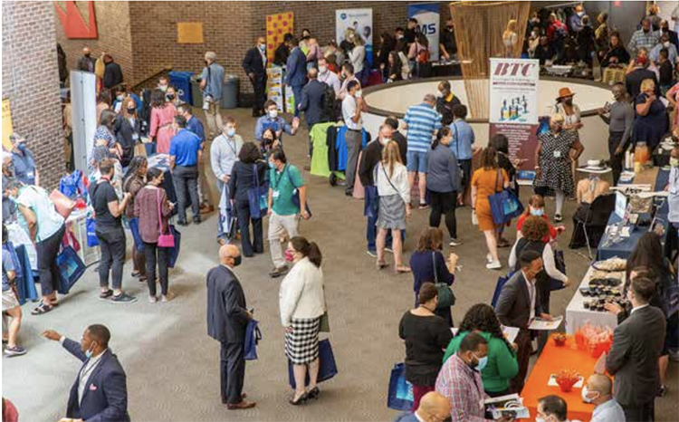 caption: The 2022 Penn Supplier Diversity Forum & Expo brought together more than 30 local and diverse suppliers showcasing their services among Penn’s community of buyers in the lobby of the Annenberg Center.