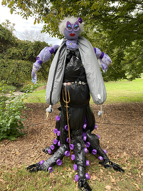 caption: A scarecrow of Ursula from a previous year’s design contest at Morris Arboretum.
