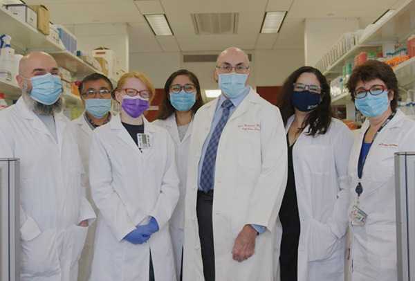 caption: Drew Weissman and his lab. Photos courtesy Penn Medicine. 