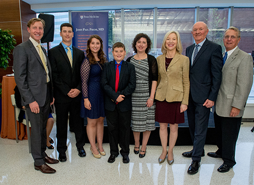 caption: J. Larry Jameson, EVP, UPHS & dean of PSOM; Dr. Pryor’s children, Francis, Danielle and John, and his wife, Carmela Calvo; Penn President Amy Gutmann; Ralph Muller, CEO, UPHS; and C. William Schwab, professor of surgery in Traumatology & Surgical Critical Care and physician-in-chief of PennSTAR.