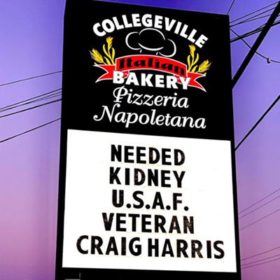 caption: Donation sign for Craig Harris